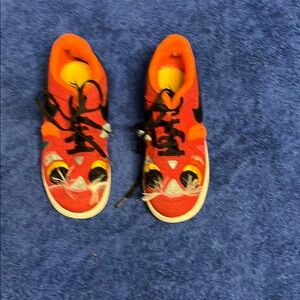 Nike Red and Black Sneakers Sporty Low-Top Design